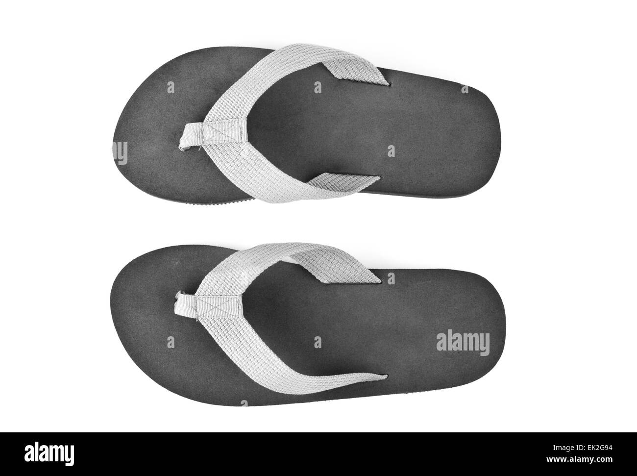pair of black flip flops isolated on white background Stock Photo - Alamy