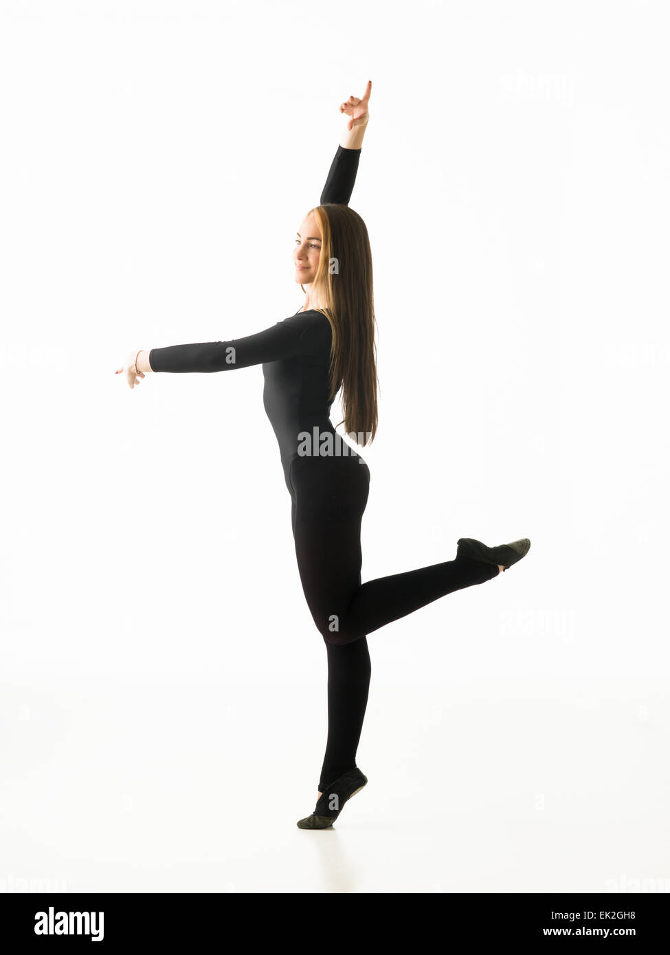 graceful ballerina dancing in studio, posing on white background Stock Photo