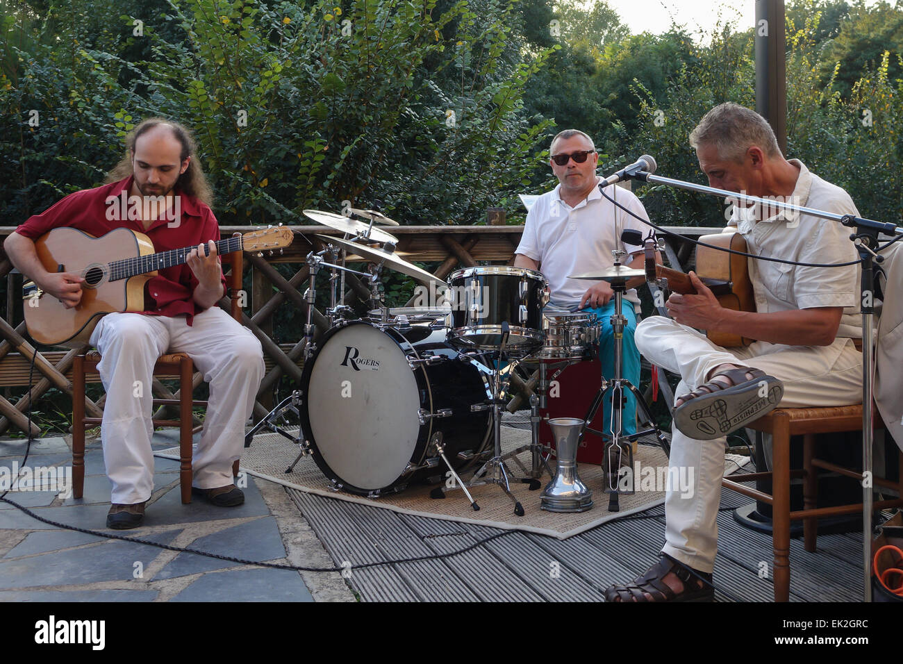 Georges Paltrié, Jean Carillo and Jack Robineau performing live jazz at Le Moulin Fort Camping, near Francueil in the Loire Stock Photo