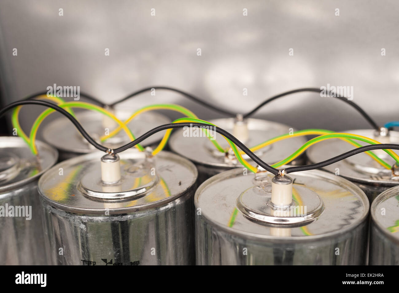 Dangerous monster sized capacitors wired in parallel with heavy gage