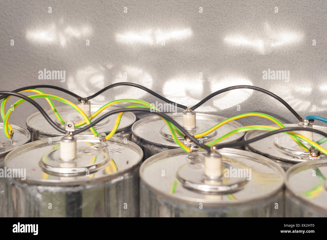 Dangerous monster sized capacitors wired in parallel with heavy gage