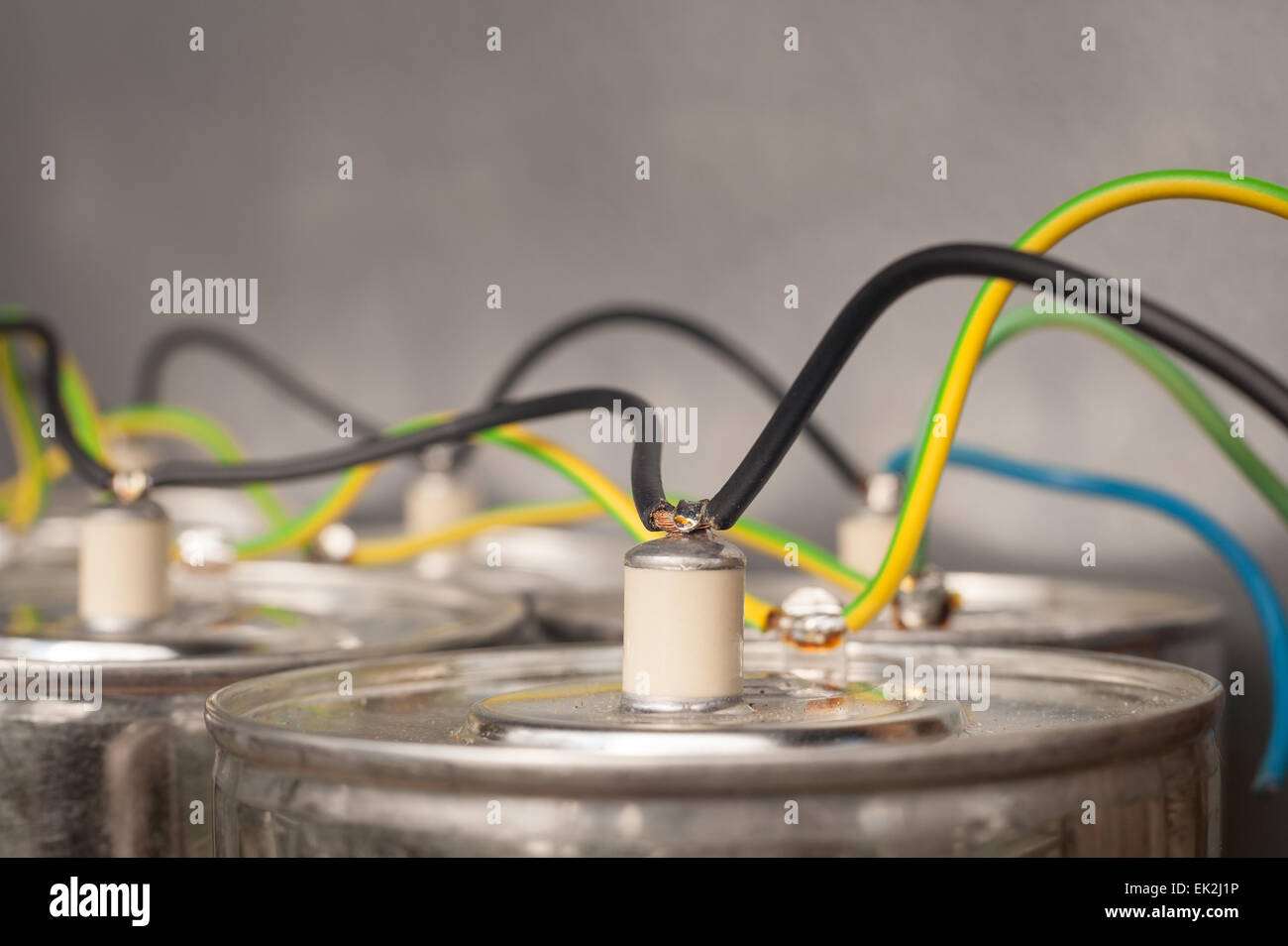 Dangerous monster sized capacitors wired in parallel with heavy gage