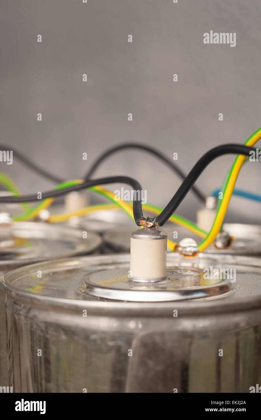 Dangerous monster sized capacitors wired in parallel with heavy gage