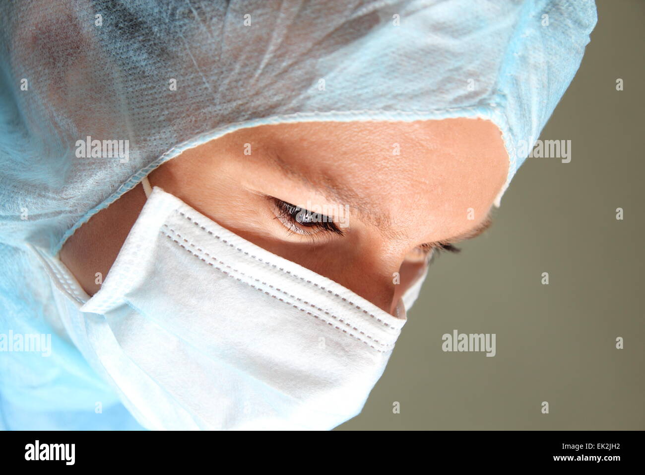 A Woman with cap and coat pharma o doctor in a hospital Stock Photo