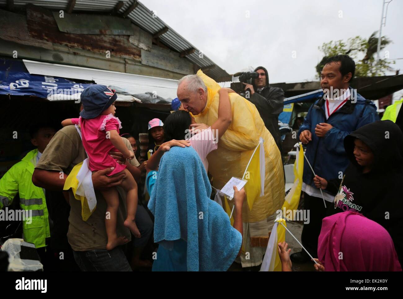Pope Francis visits victims of typhoon Yolanda January 17, 2015 in Palo, Leyte Province, The Philippines. The Pope shortened his visit to the province due to a typhoon in the area. Stock Photo