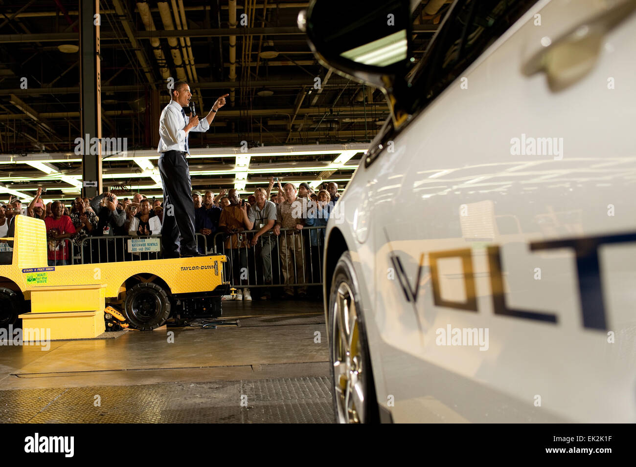 US President Barack Obama delivers remarks at General Motors Auto Plant where the all electric Chevy Volt is assembled July 30, 2010 in Hamtramck, Michigan. Stock Photo