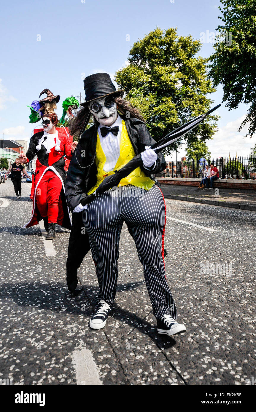'The Penguin' from Batman walks down a road during a street parade Stock Photo
