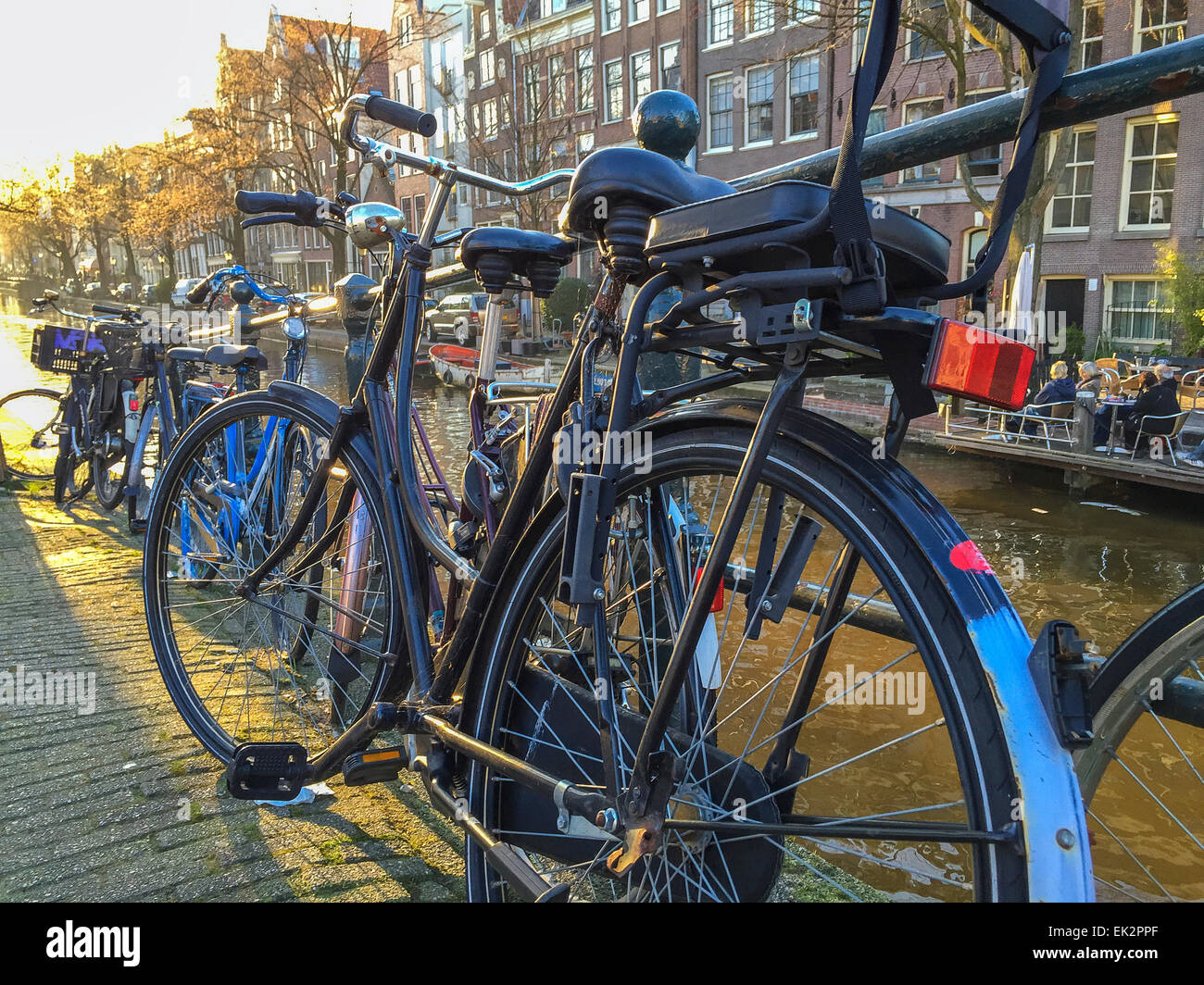 Parked bicycle with child's seat in Amsterdam Stock Photo