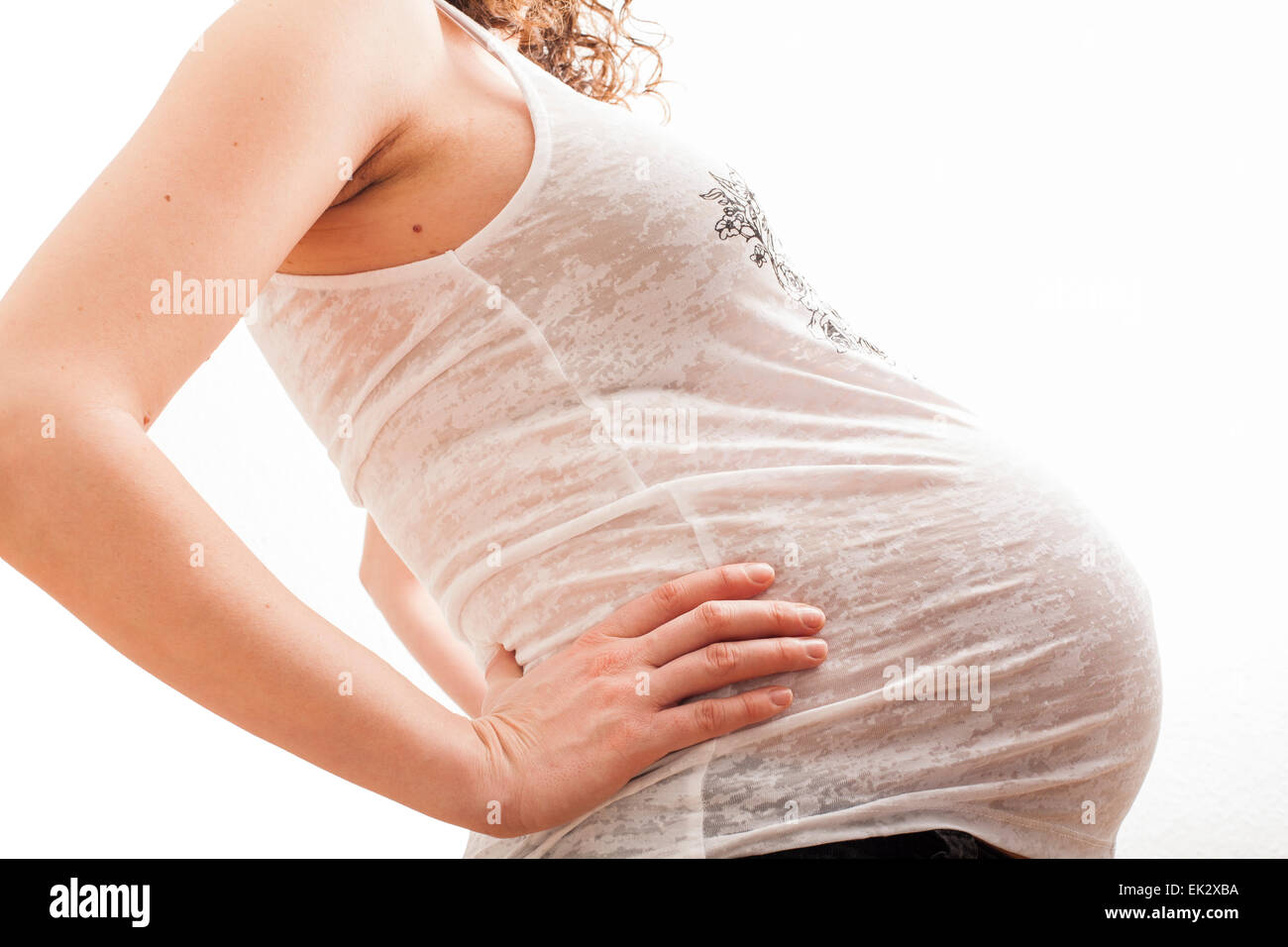 39 year old heavily pregnant woman in her late 30's. Stock Photo