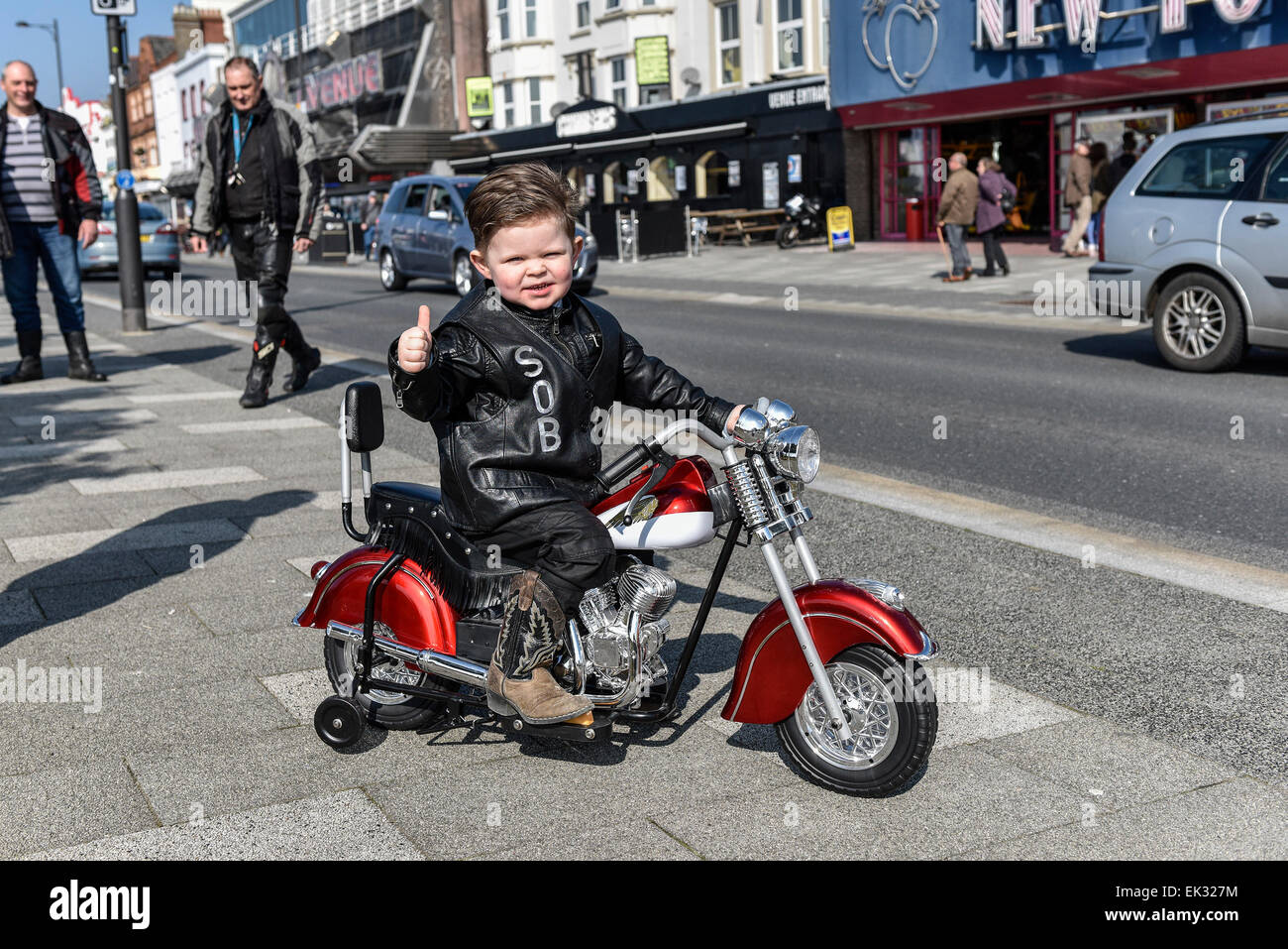 Southend on Sea, UK. 6th April, 2015. Monday 6th April, 2015.  Southend on Sea.  Hudson, aged 3 from Hoddiston, is a very keen biker and attended the Southend Shakedown on his own electric motorbike.  This Easter Bank Holiday over 10,000 motorbikes, scooters and trikes converged on Southend in Essex.  This event is a great way to dust off those winter blues, rev up and join Ace Cafe London’s first major ride out of the year. Credit:  Gordon Scammell/Alamy Live News Stock Photo