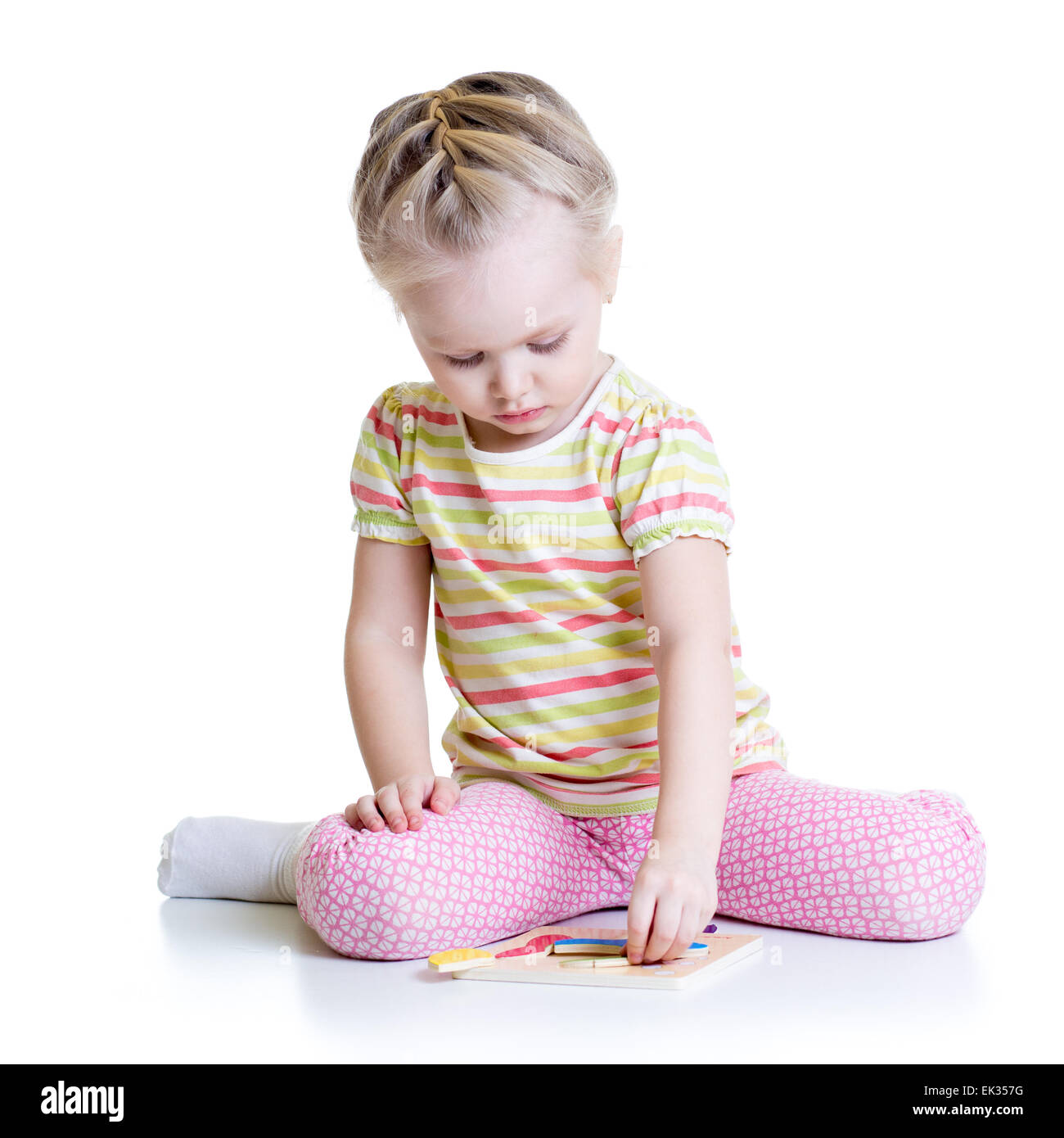 Little Cute Girl Solving puzzle Stock Photo Alamy