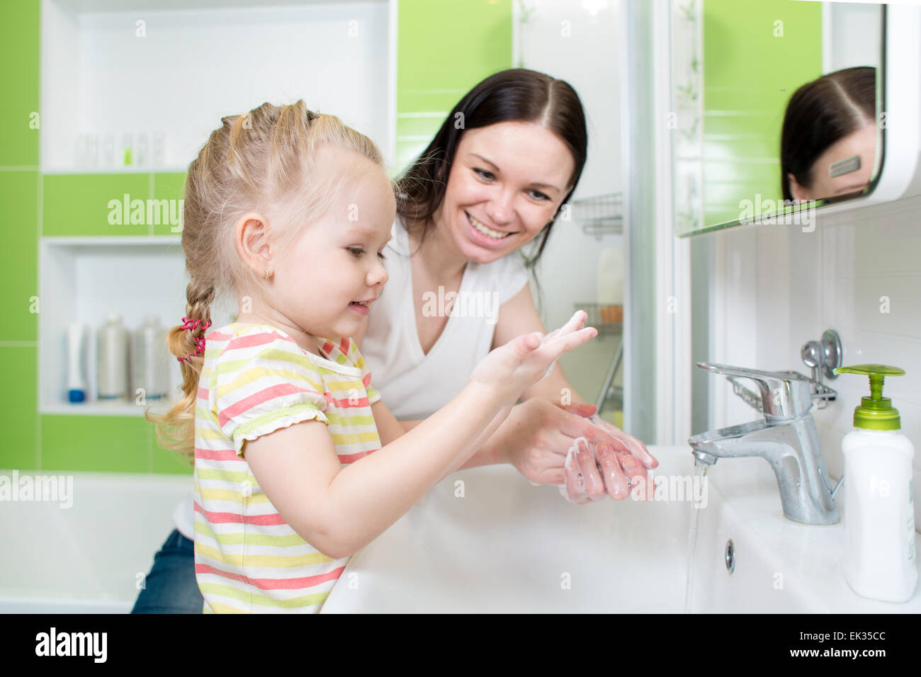Mother Washing Baby In Sink Stock Photos Mother Washing