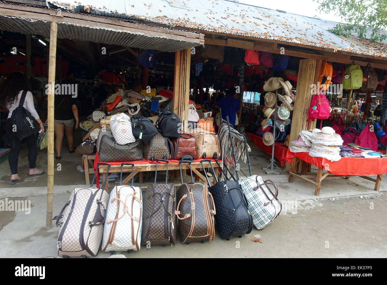 Counterfeit brand products, such as bags and suitcases, are sold on a marketplace in Don Sao, Laos, 25 February 2015. Photo: Alexandra Schuler/dpa - NO WIRE SERVICE - Stock Photo
