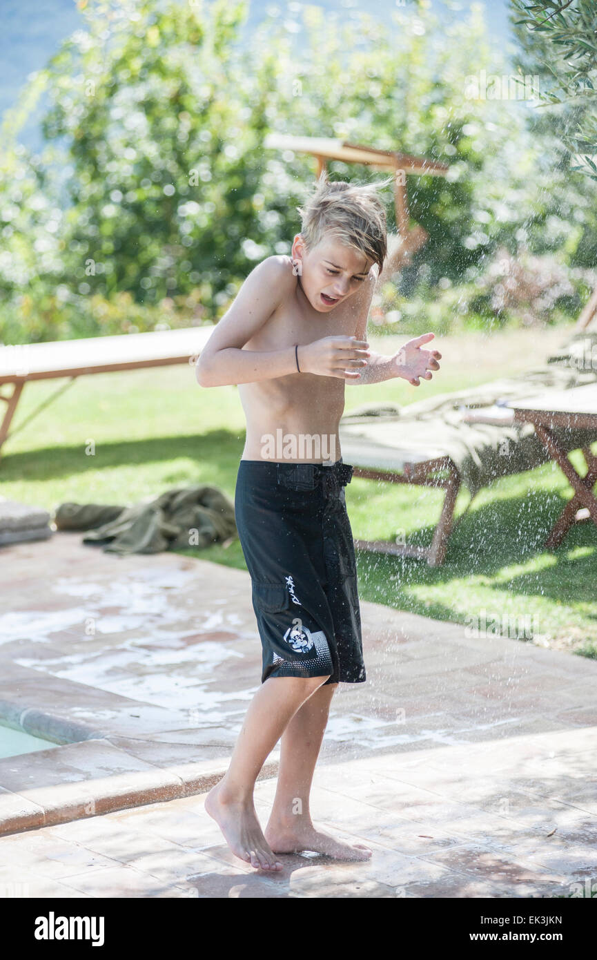 Swimming trunks boy hi-res stock photography and images - Alamy