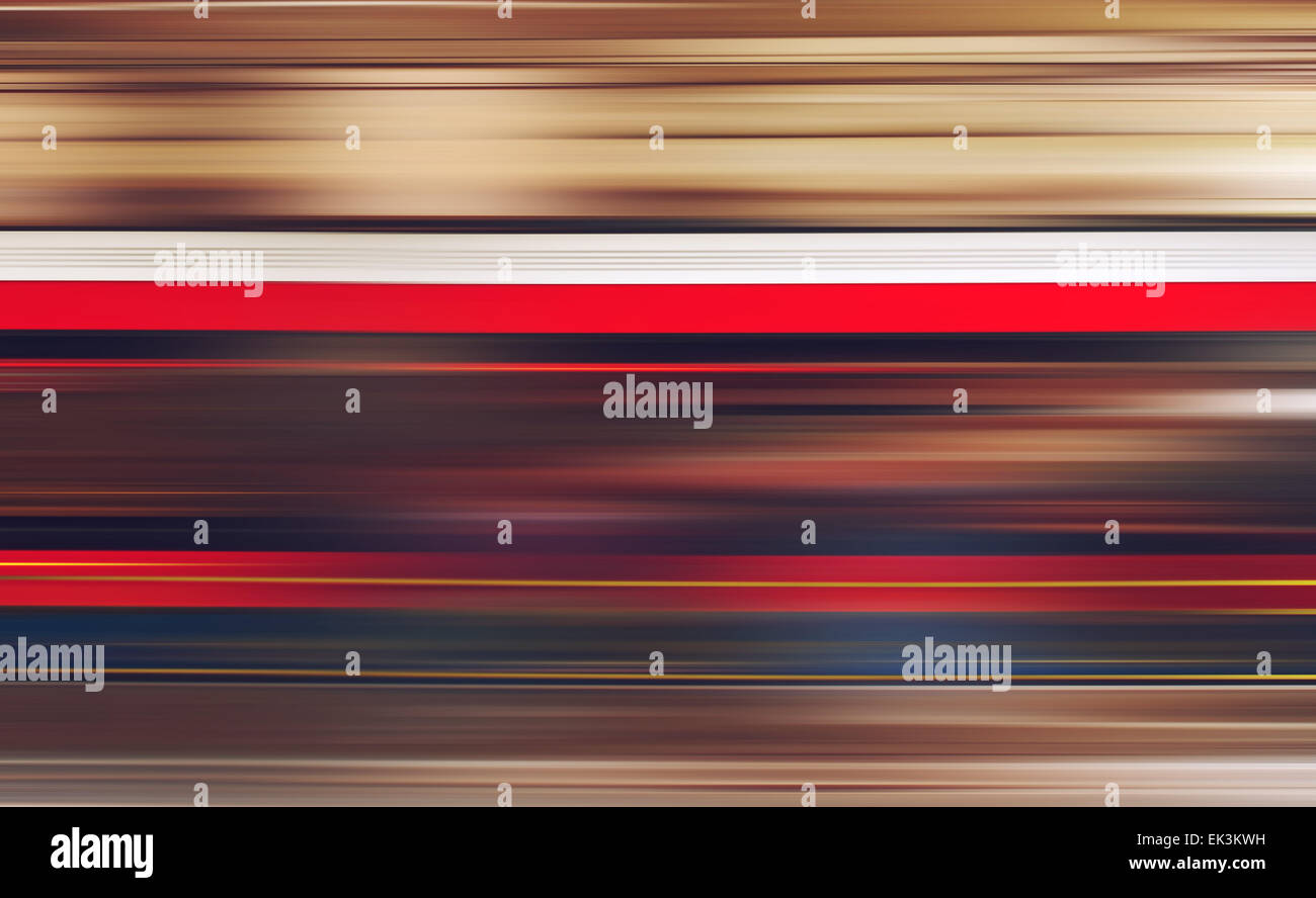 Blurred defocused subway train in motion as abstract urban background, speed and living fast in modern urban cities Stock Photo