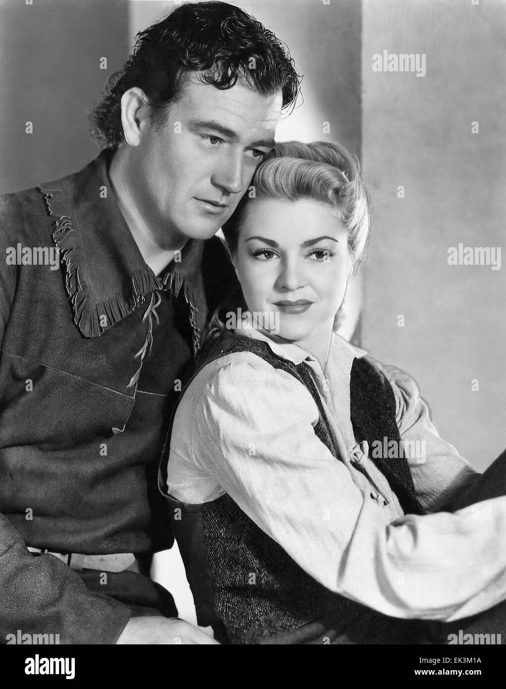 John Wayne, Claire Trevor, on-set of the Film 'Allegheny Uprising', 1939 Stock Photo