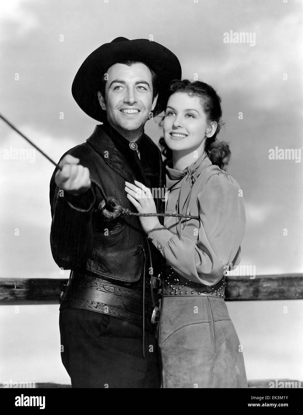 Robert Taylor, Mary Howard, on-set of the Film 'Billy the Kid', 1941 Stock Photo