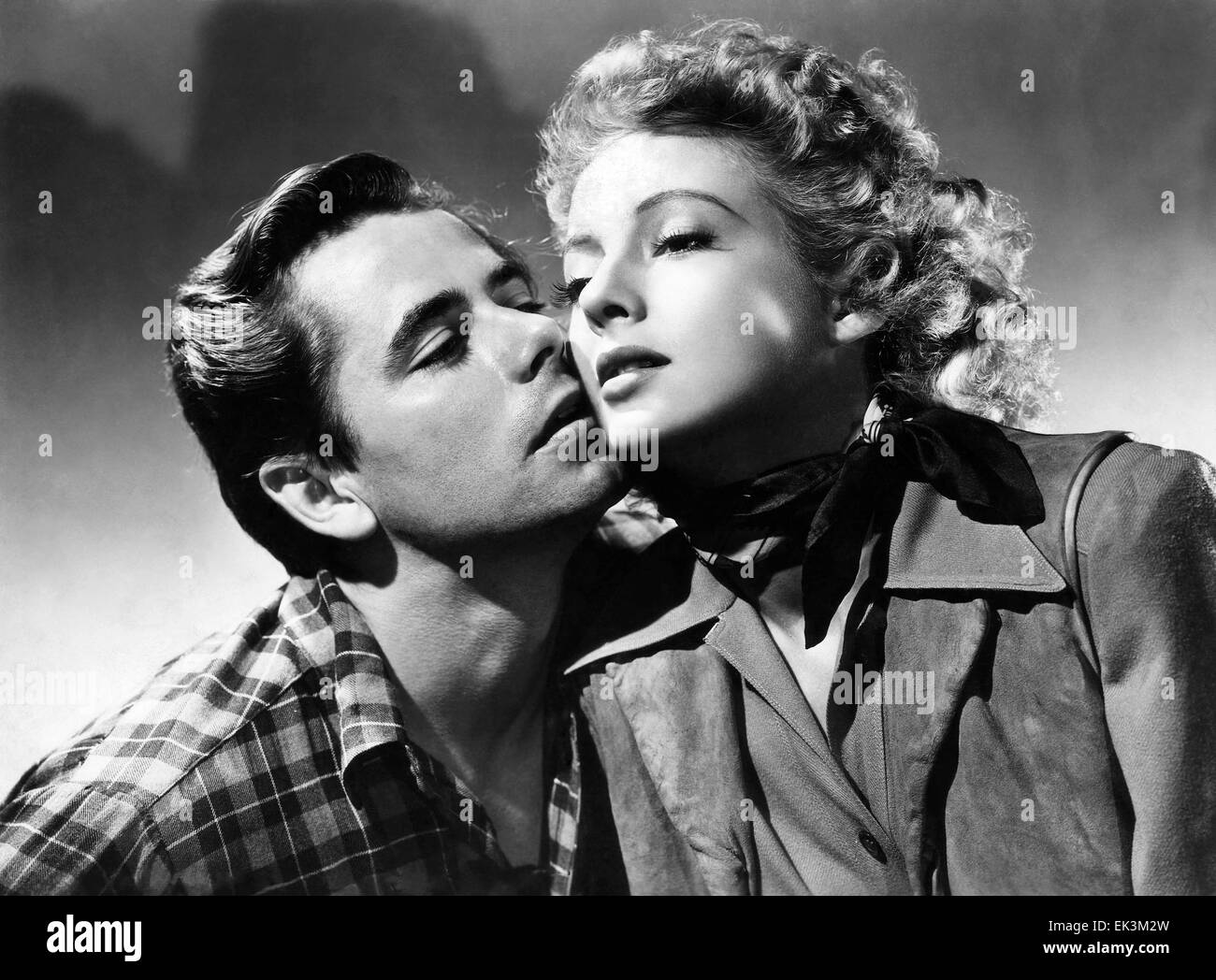 Glenn Ford, Evelyn Keyes, on-set of the Film 'The Desperadoes', 1943 Stock Photo