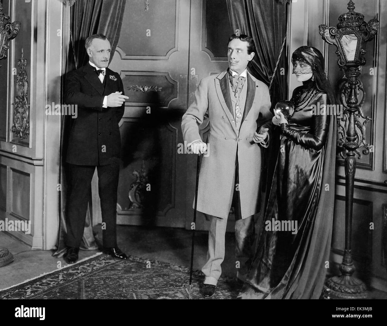 Lewis Stone, (left), Barbara La Marr, on-set of the Silent Film 'Trifling Women', 1922 Stock Photo