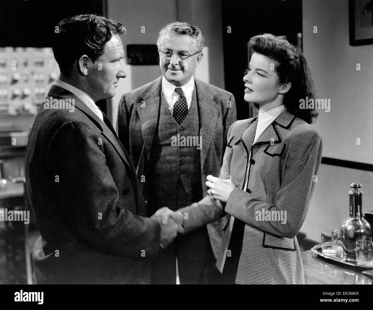 Spencer Tracy, Reginald Owen, Katharine Hepburn, on-set of the Film 'Woman of the Year', 1942 Stock Photo