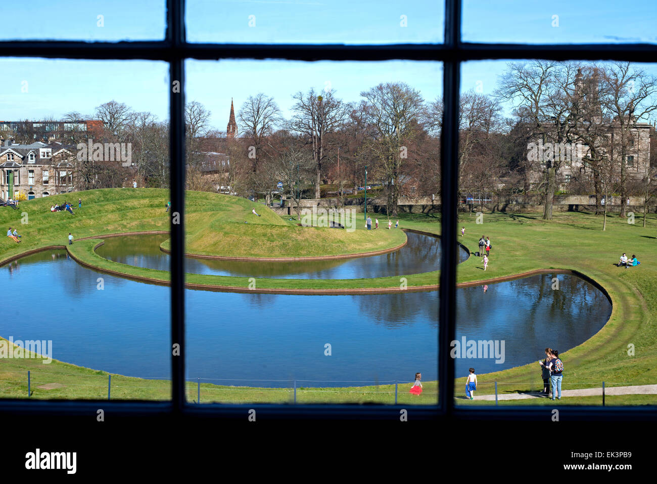 Charles Jencks' Landform seen through the window of the Scottish National Gallery of Modern Art in Edinburgh. Stock Photo