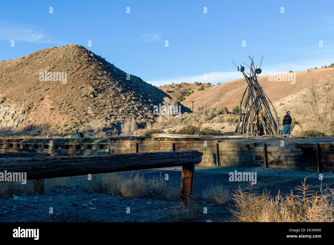 Barren land along Arkansas River owned by Union Pacific Railroad. An artist has creatively arranged some of the relics. Stock Photo