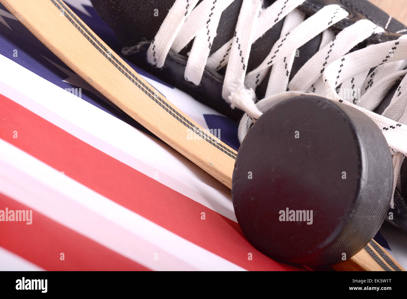 Puck, skates and hockey stick of the American flag Stock Photo