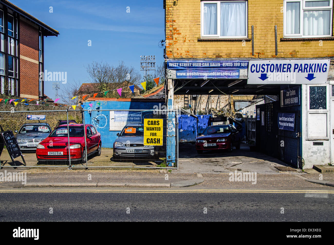 A back street car sales lot in Southend on Sea, Essex. Old cars. Stock Photo