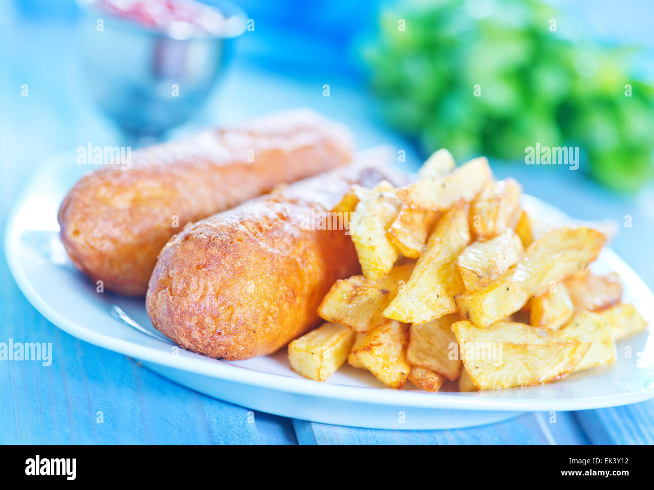 corndogs on the plate and on a table Stock Photo