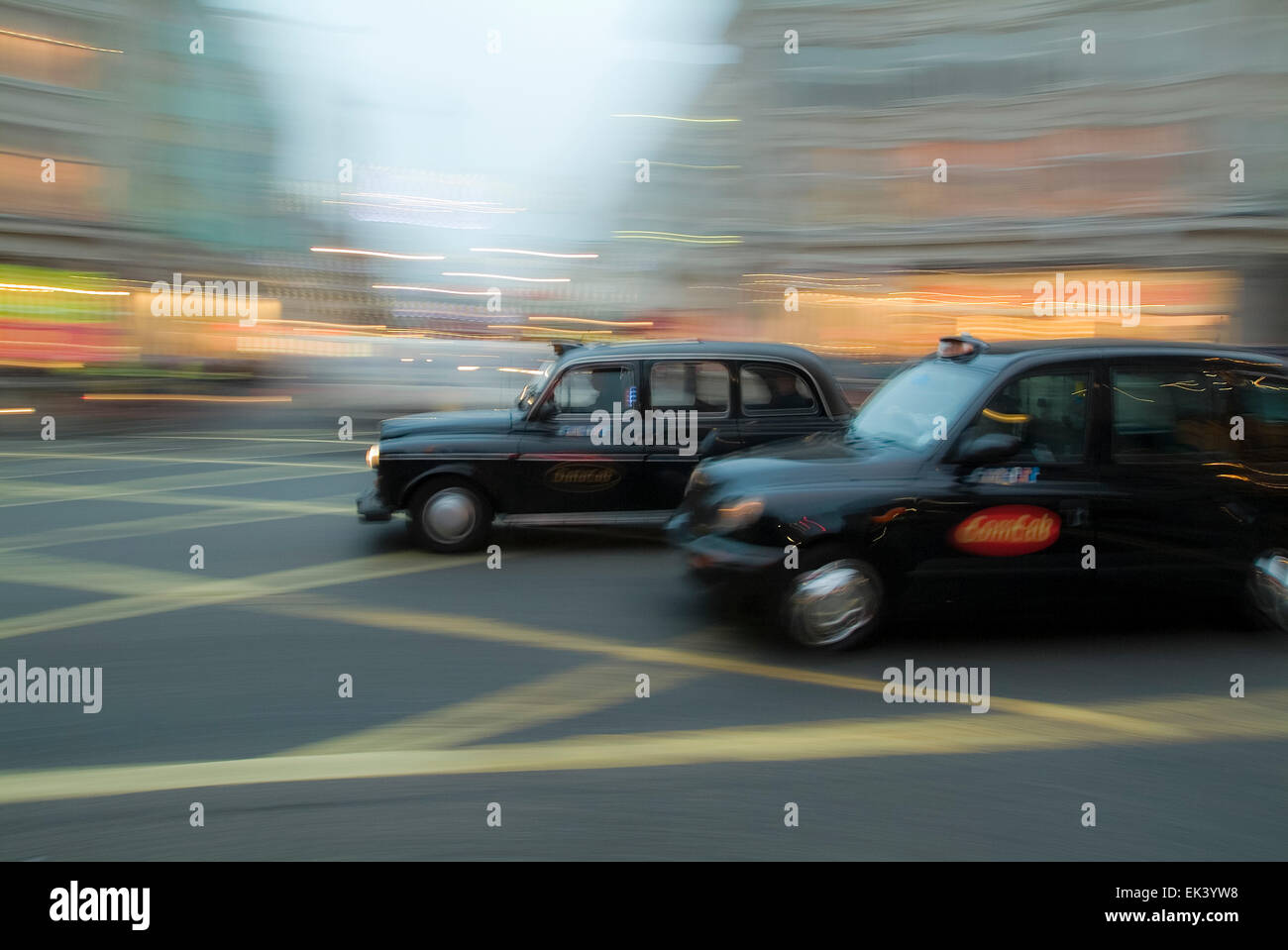 Two Taxi cab panning  in London England United Kingdom Europe Stock Photo