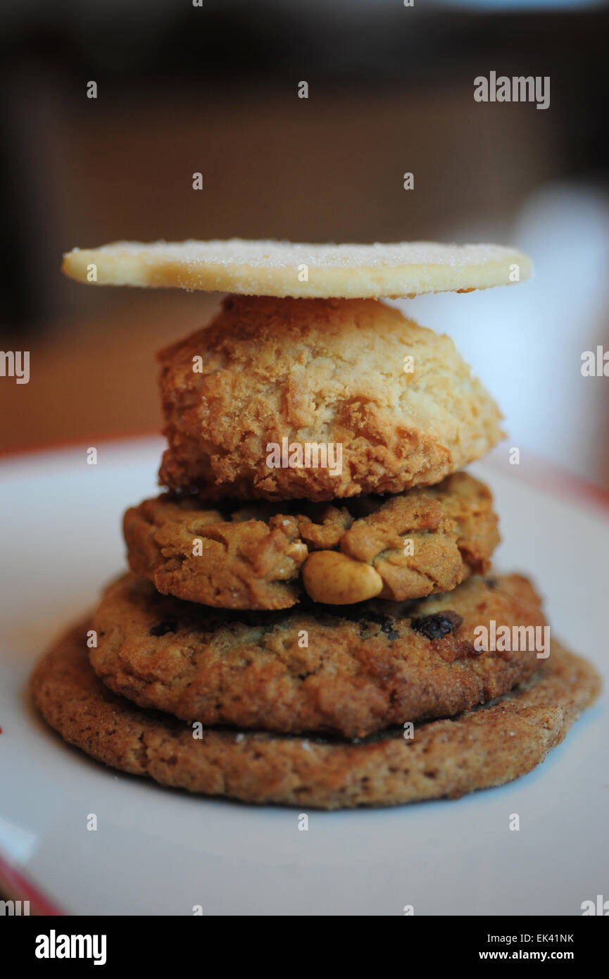 Food desserts baked goods - an assortment of home made cookies on a white plate Stock Photo