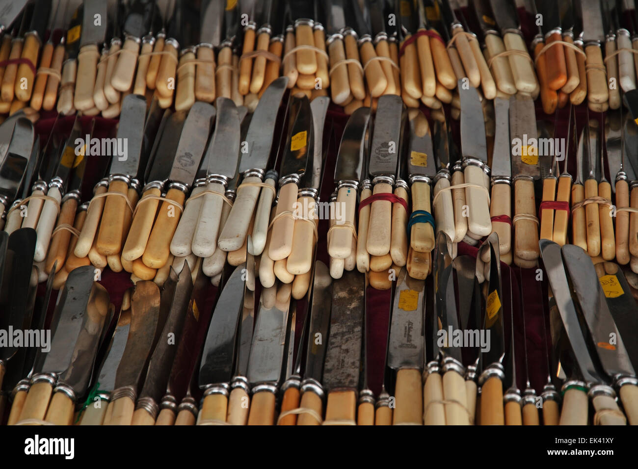 A selection of vintage Bone or Ivory handle table knives Stock Photo