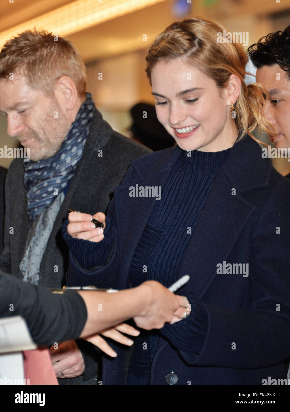Lily James, Kenneth Branagh, April 6, 2015, Tokyo, Japan: Actress Lily James and director Kenneth Branagh arrive at Haneda International Airport in Tokyo, Japan, on April 6, 2015. Stock Photo