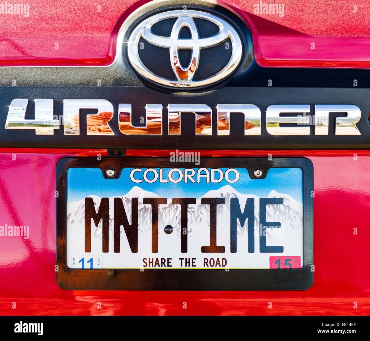 Mountain Time license plate on 2014 Toyota 4Runner Trail Premium on rough four wheel drive 4WD road, Central Colorado, USA Stock Photo