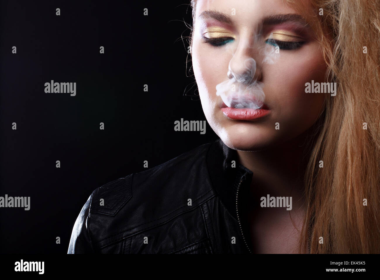 Retro Portrait Of Beautiful Woman With Cigarette Stock Photo