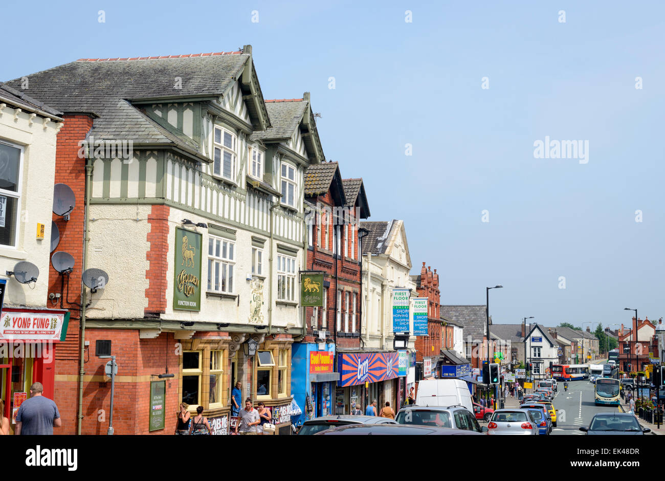 Main street of a typical busy English town, in summer; small town England; UK; small British town; town centre; townscape Stock Photo