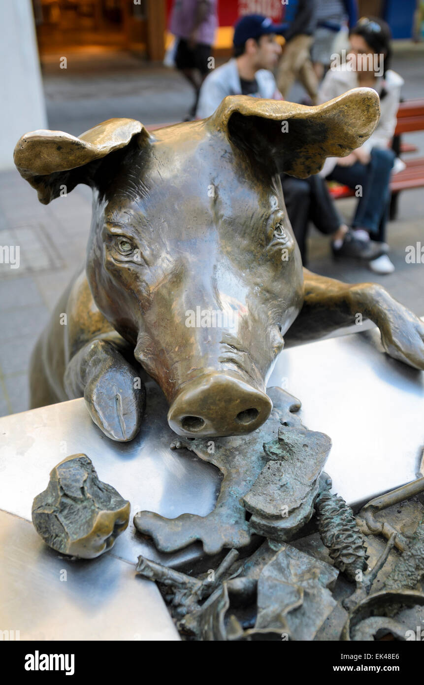 The Rundle Mall Pigs are a set of bronze sculptures / statues of pigs in life-like poses. Stock Photo