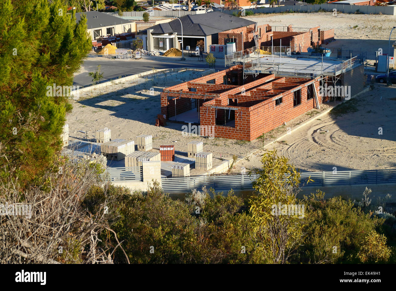 New houses being built on the edge of bushland in the suburbs of Perth