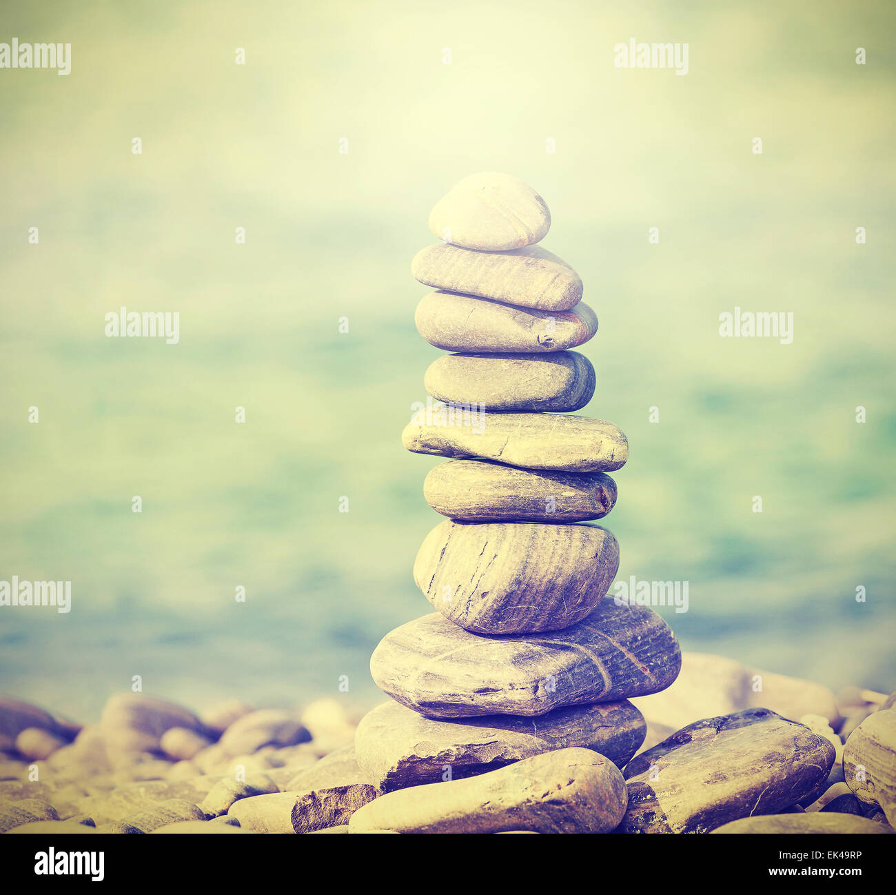 Retro filtered heap of stones, Zen spa concept background. Stock Photo