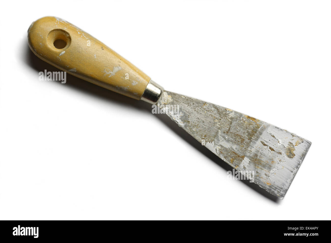 worn scraper spattle spatula on white background Stock Photo
