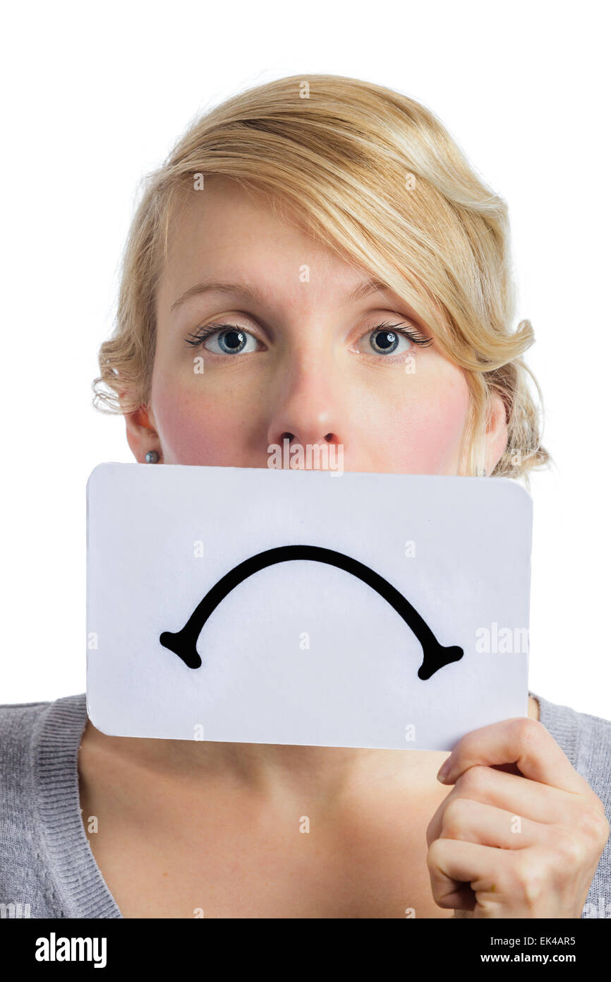 Unhappy Portrait of a Woman Holding a Sad Mood Board Isolated on white Background Stock Photo