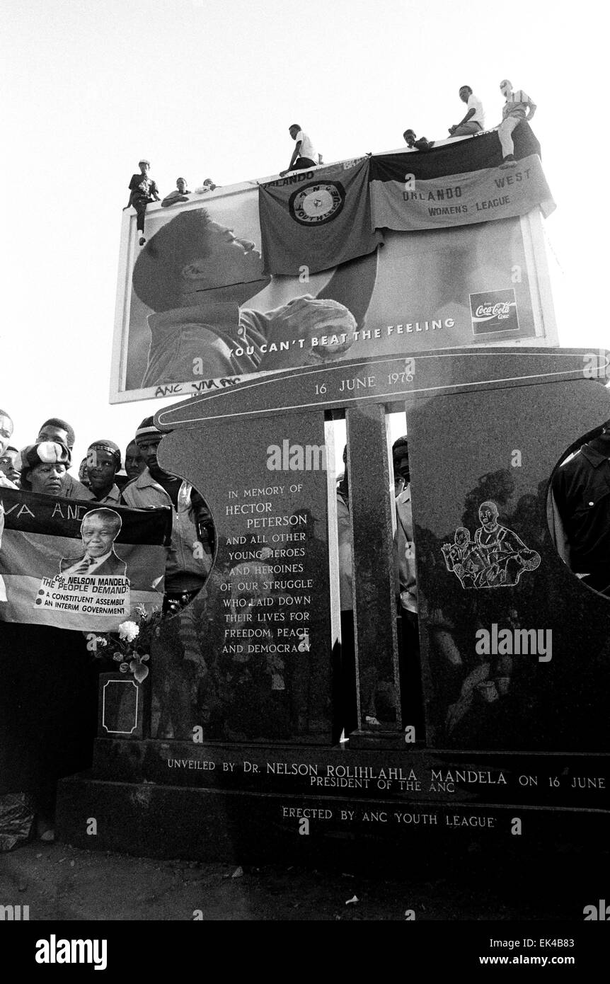 Memorial to Hector Pieterson and all the other young heroes and heroines of our struggle unveiled Soweto by Nelson Mandela, Soweto,  16 June 1992.ANC president Nelson Mandela unveiled a memorial tombstone symbolising the death of student Hector Petersen, said to have been the first person to die on June 16, 1976, and honouring more than 600 people killed in violent confrontations with police since that day.Defying calls on his organisation call off its mass actioncampaign, Mr Mandela also led a march by about 2000 supporters through Soweto to the memorial site at the Regina Mundi Church.He was Stock Photo