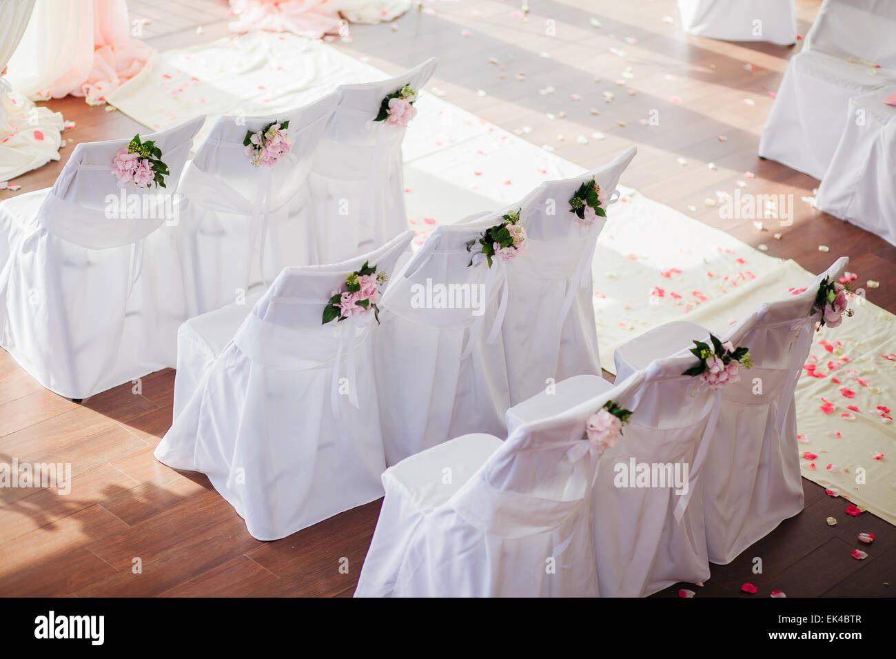 wedding chair covers with pink flowers Stock Photo