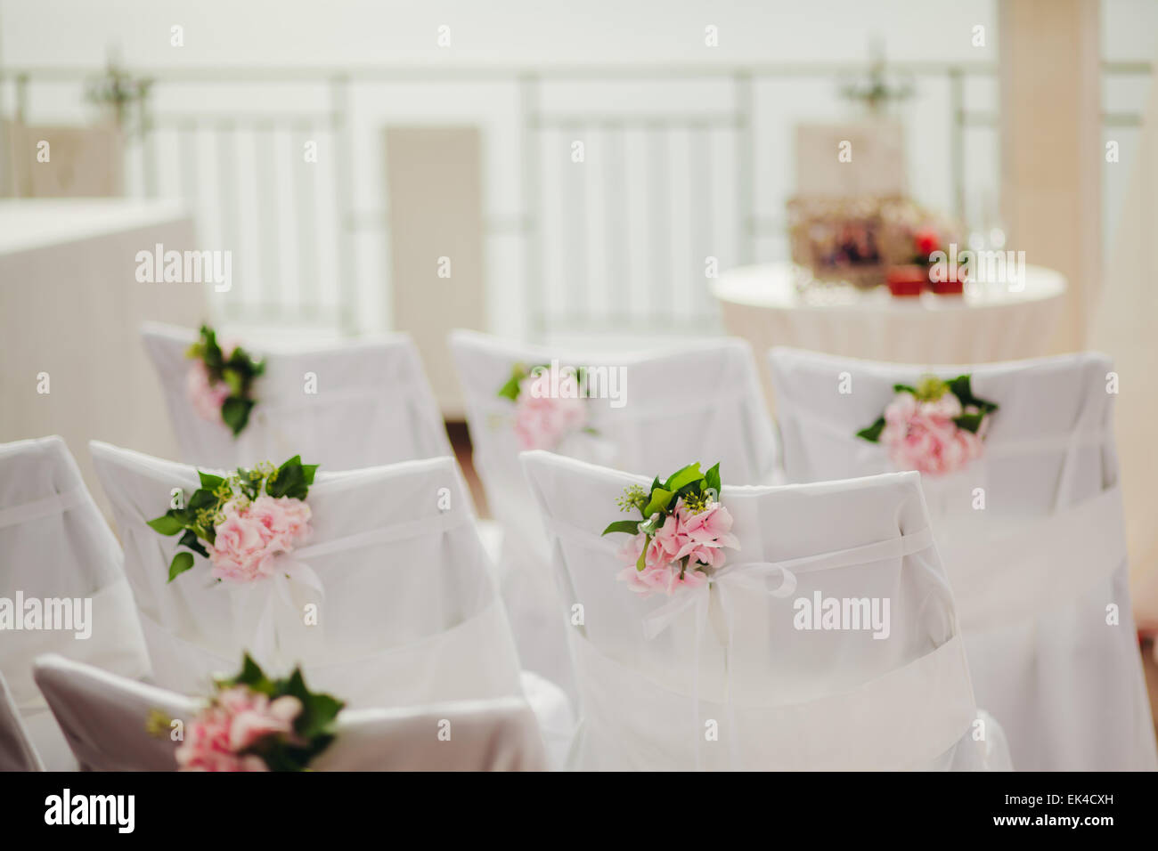 wedding chair covers with pink flowers Stock Photo