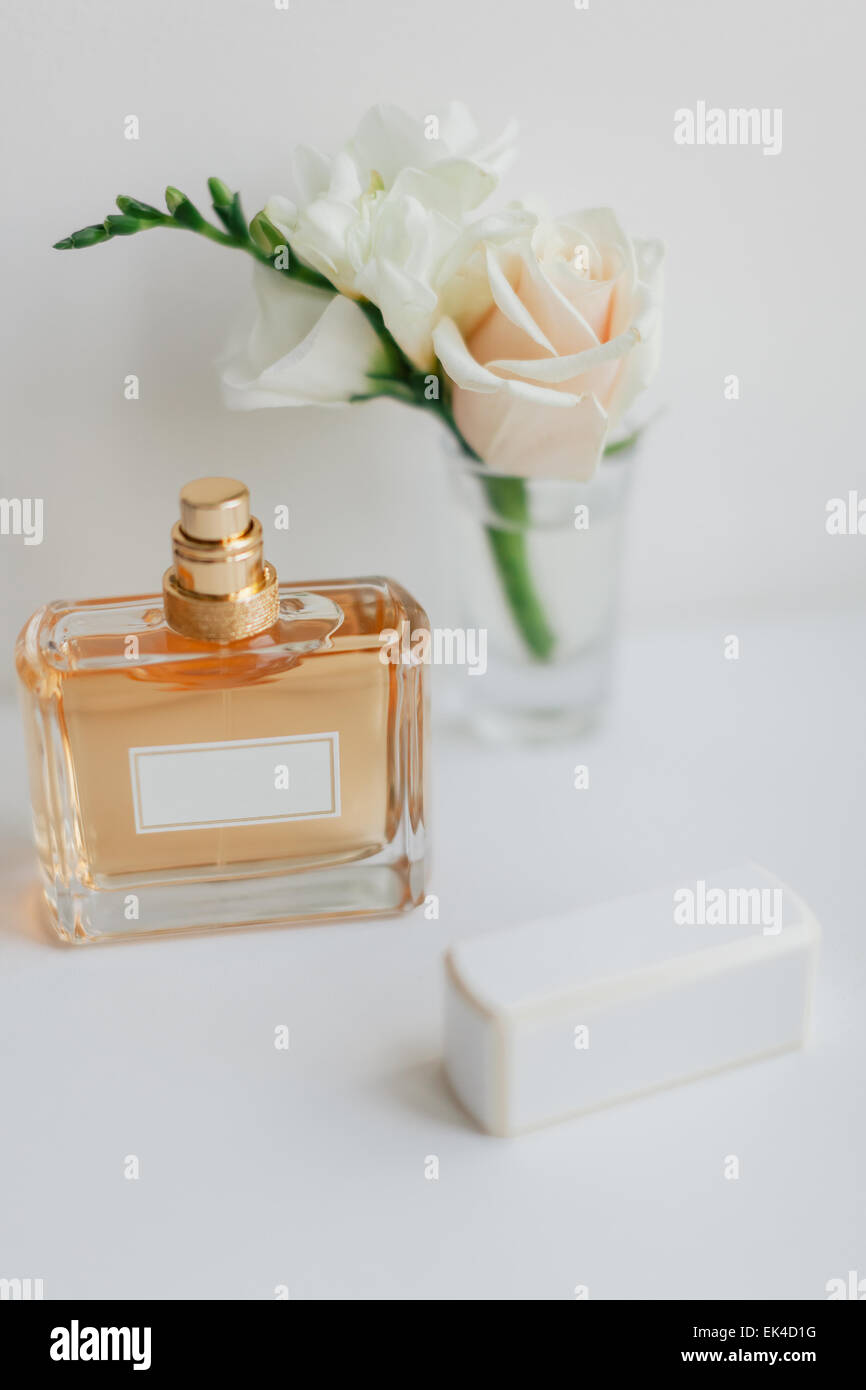 bride's parfum with buttonhole background Stock Photo
