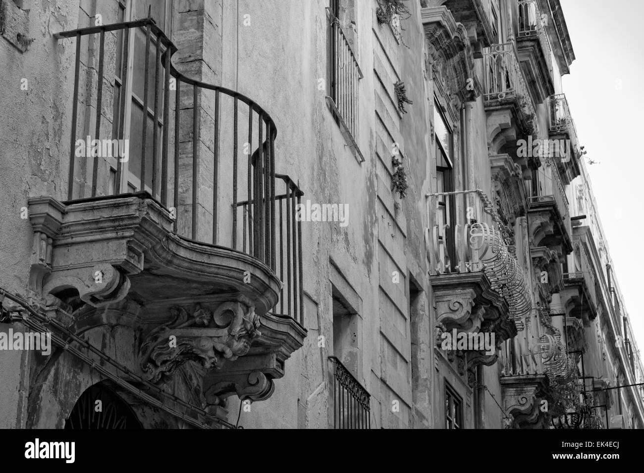 Italy, Sicily, Siracusa, Ortigia, original balcony in a baroque building facade Stock Photo