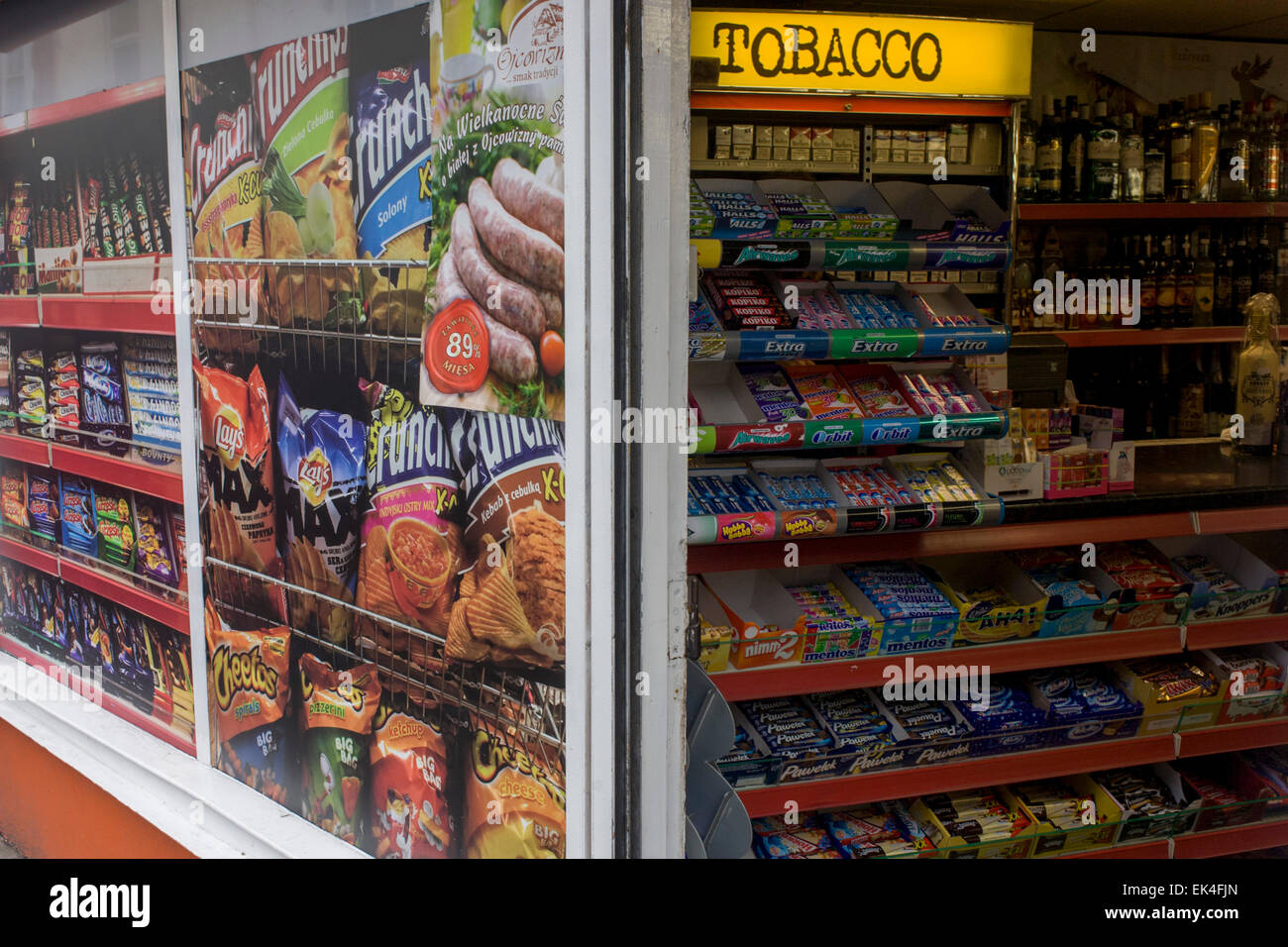Frontage poster and shelves with stock of a corner shop in Westonsuper
