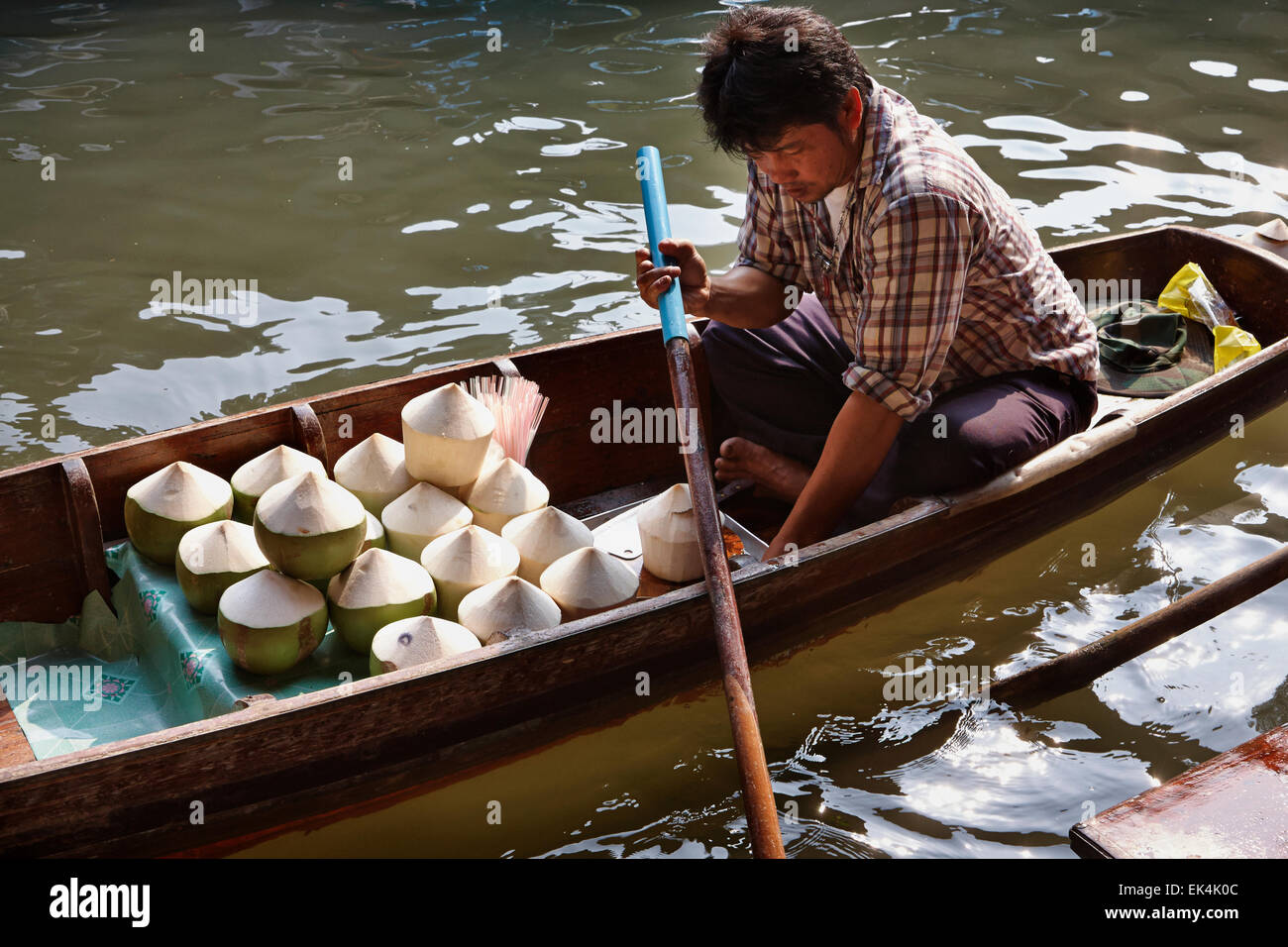 Thailand, Bangkok: 14th march 2007 - coconuts seller at the Floating ...