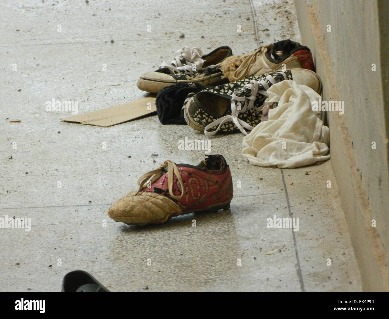 Garissa. 6th Apr, 2015. Photo taken on April 6, 2015 shows misplaced shoes after Al-Shabaab gunmen attacked the Garissa University College in Garissa, northeastern Kenya. At least 142 students, three police officers and three soldiers were killed in the massacre last week at the Garissa University College. Credit:  Stephen Ingati/Xinhua/Alamy Live News Stock Photo