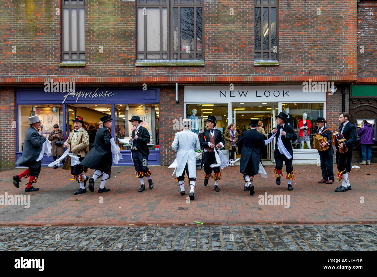 Sompting Village Morris Dancers Perform In The High Street, Lewes, Sussex, UK Stock Photo